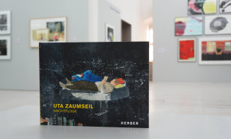Buch mit buntem Cover und dem aufgedruckten Text "Uta Zaumseil Nachtflüge". 
